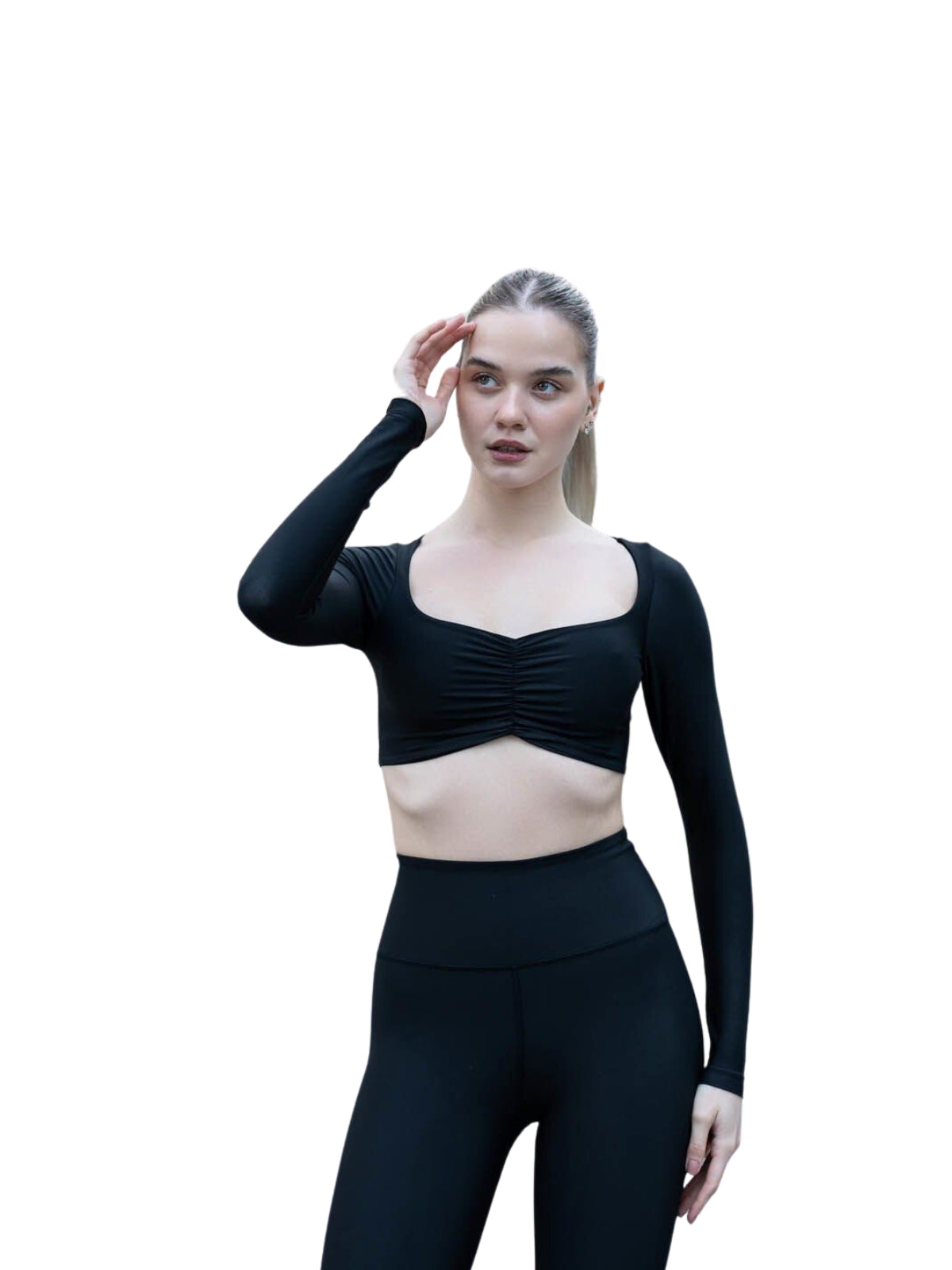 Frau in einem Lismina 080 Ruffled Langarm Shirt und Leggings posiert für Tanzen Yoga Fitness vor einem weißen Hintergrund.